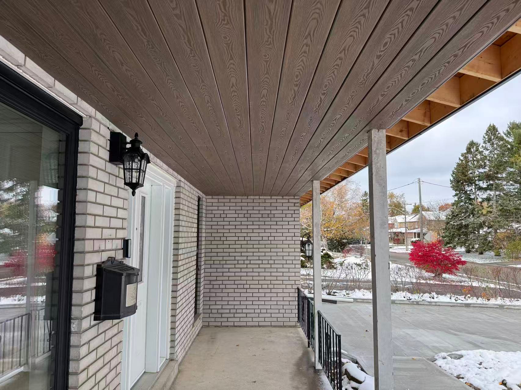 Charcoal SoffiWood front porch ceiling on a brick house in Scarborough, Toronto